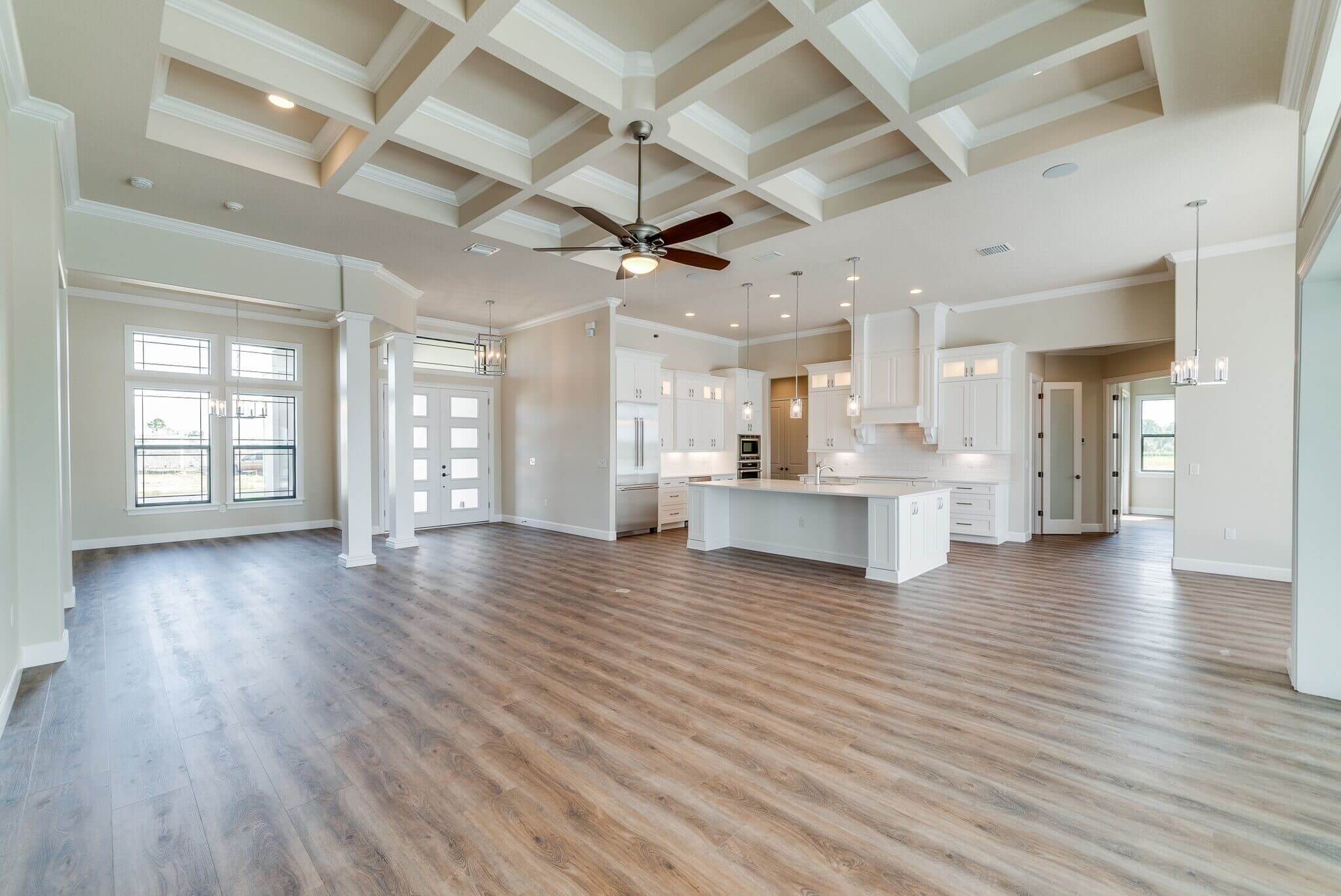 Embossed wood grain resilient laminate flooring installed in an open-concept great room