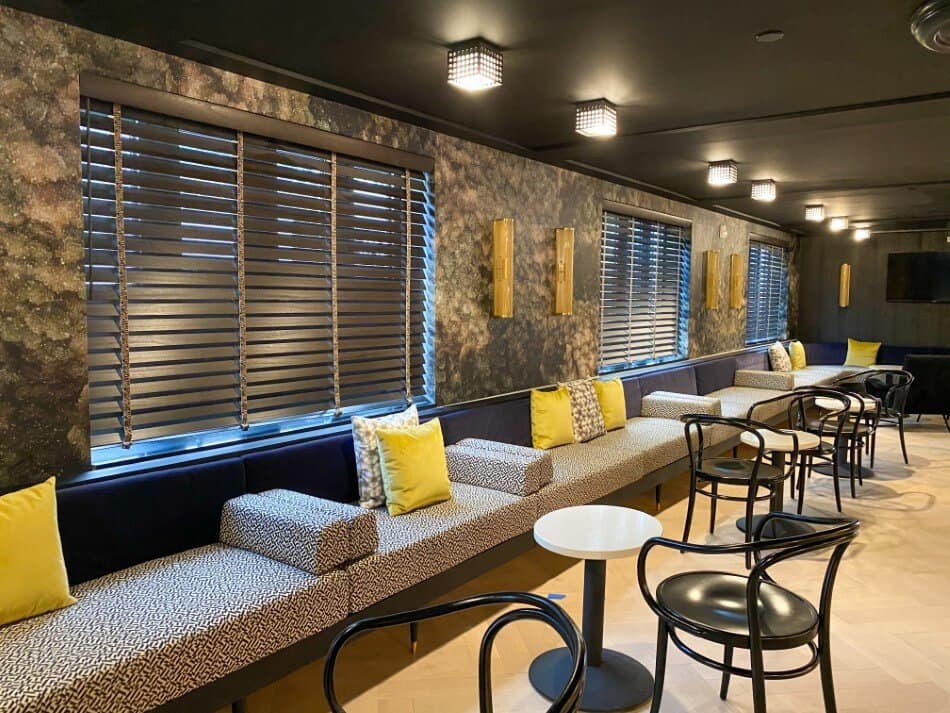 Hospitality dining room flooring and window treatments
