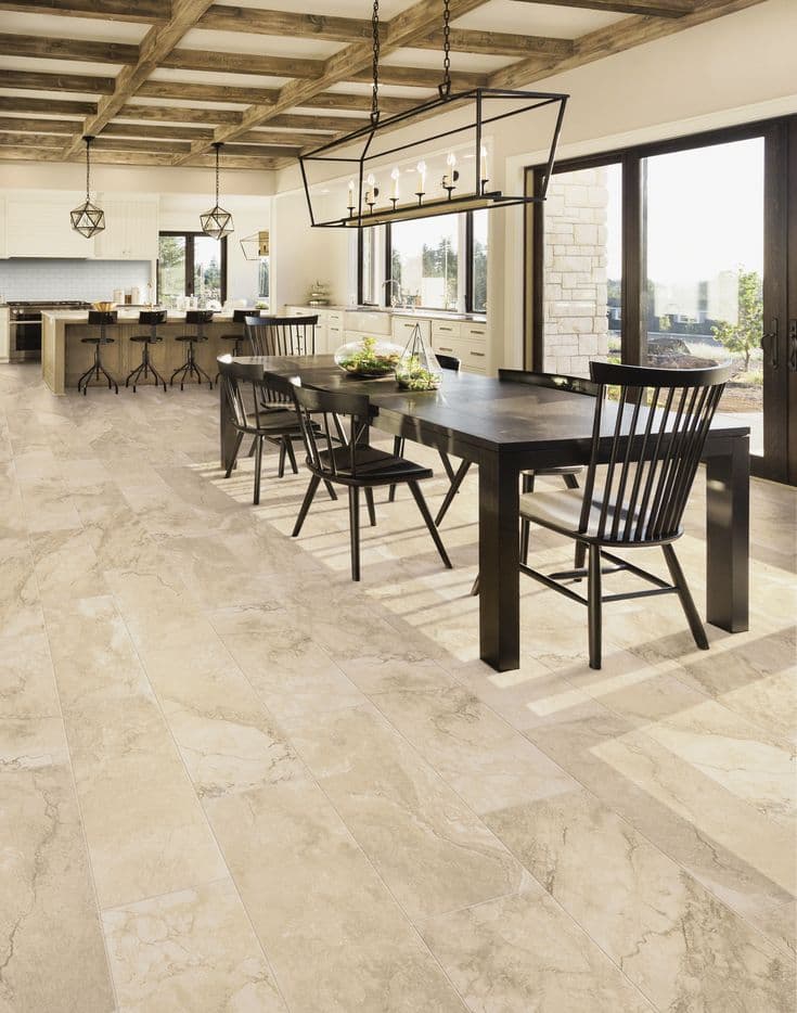 Commercial dining room with warm wood flooring and ambient accent lighting