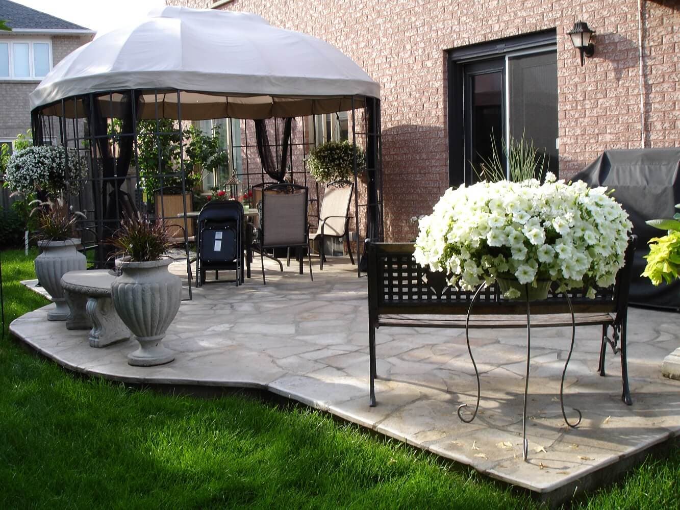 Front entrance portico and exterior stone pillars