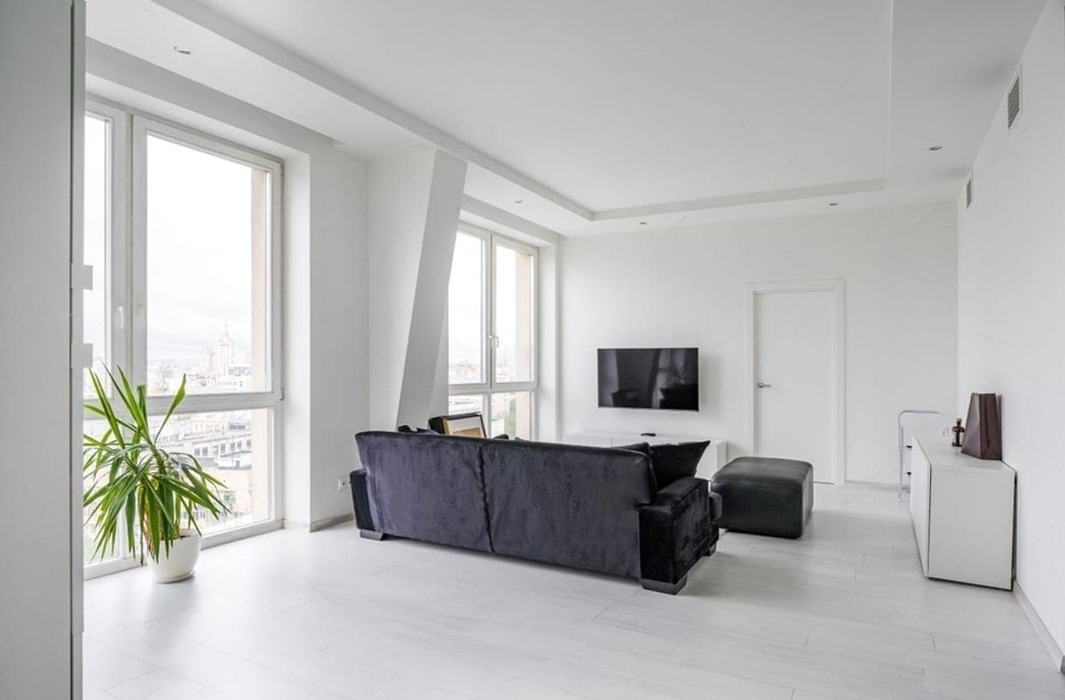 Minimalist executive suite glazing and luxury plank flooring